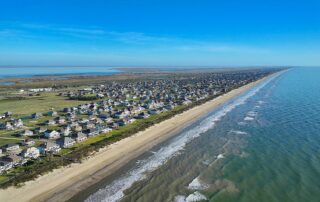 Aerial Beachfront View Down Beachfront In Crystal Beach Texas