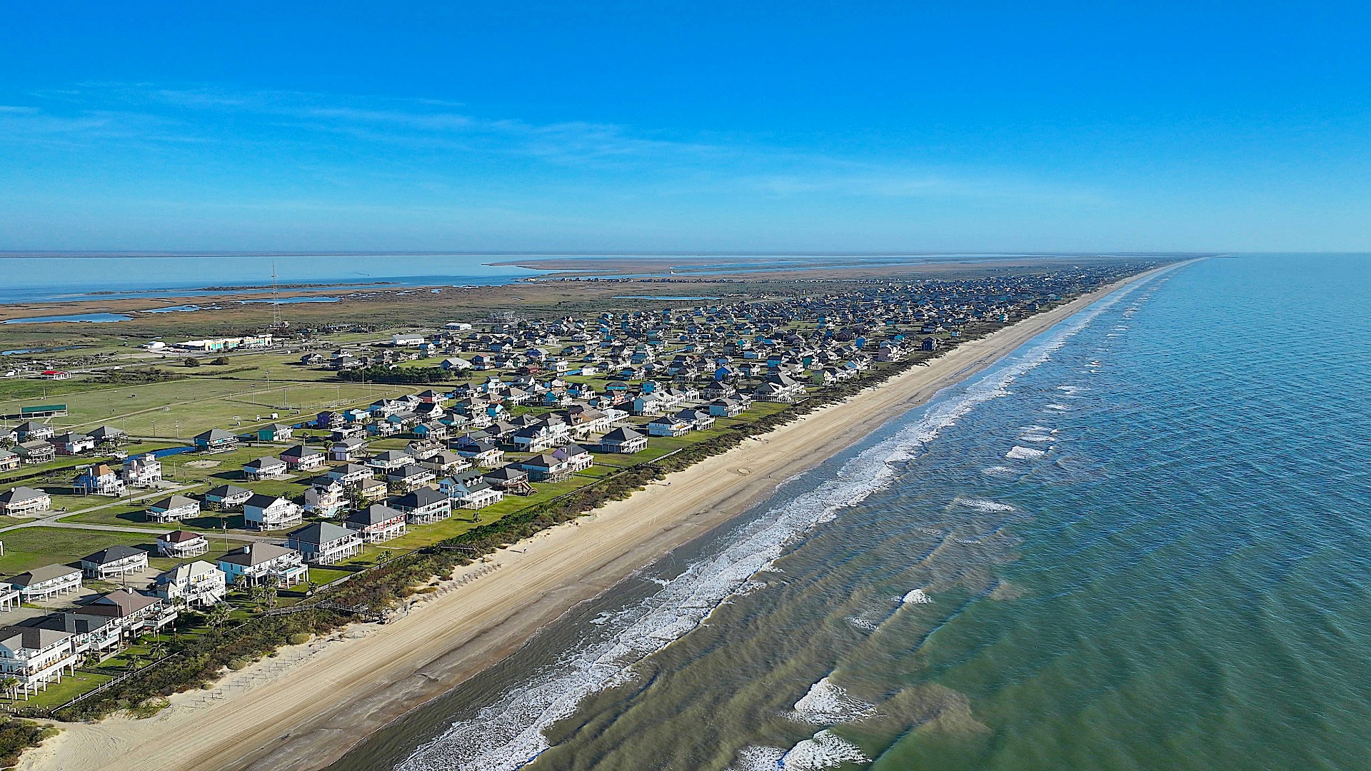 Aerial Beachfront View Down Beachfront In Crystal Beach Texas