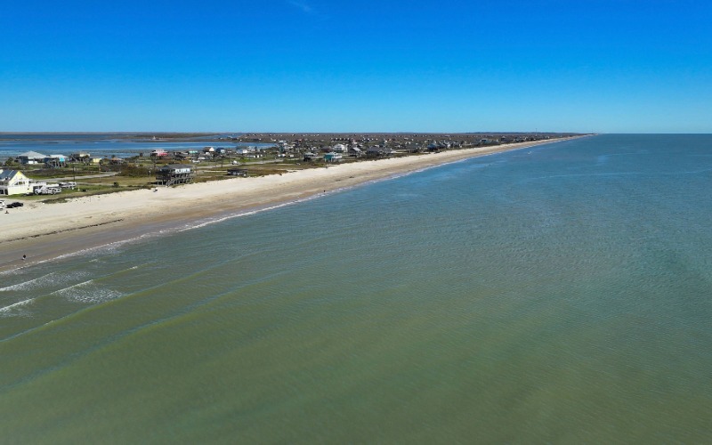 Beachfront View With Clean Beach Aerial View aerial-view-of-beach-and-crystal-beach-texas