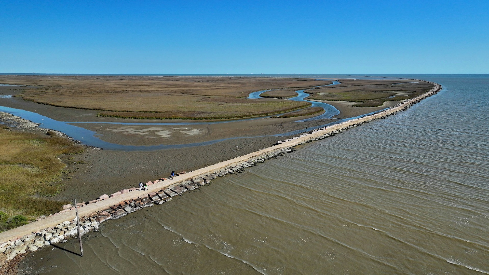 Side view down north jetties from entrance