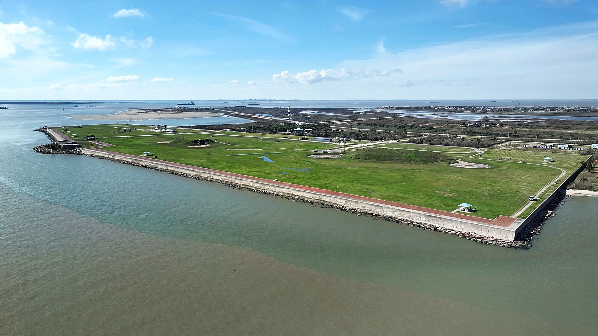 Aerial Of Fort Travis With Lighthouse On Background